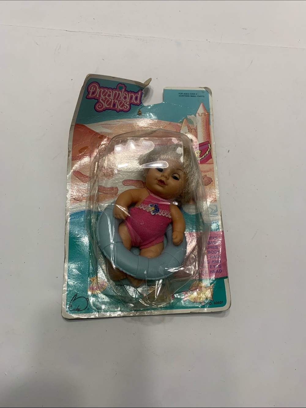 Dreamland Baby Doll in Pink Swimsuit with Blue Float